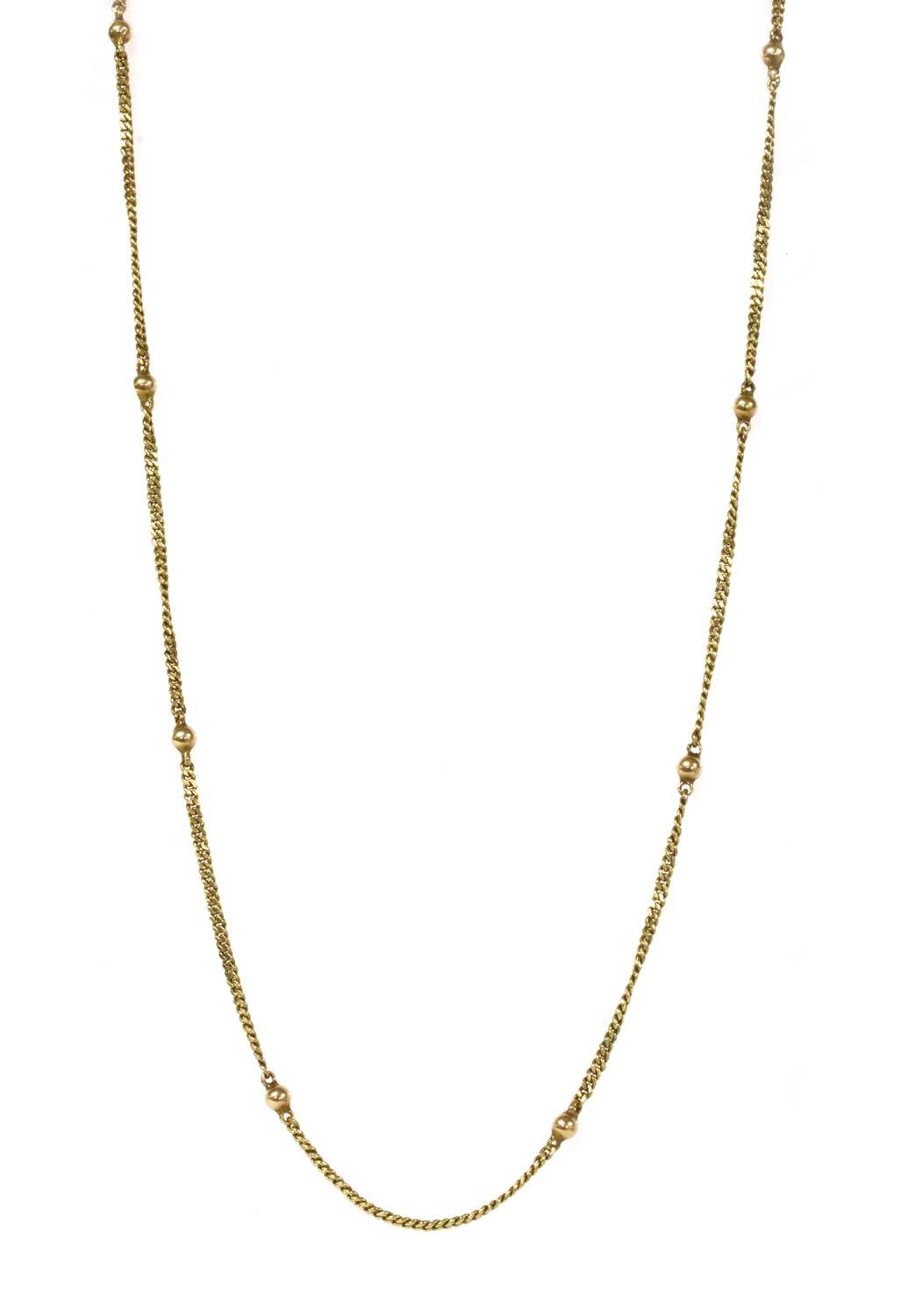 Lot 1144 - A gold bead and curb link chain