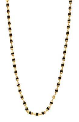 Lot 1149 - An Indian high carat gold necklace