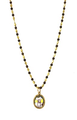 Lot 1148 - An Indian high carat gold pendant and chain
