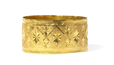 Lot 1161 - An Indian high carat gold bangle