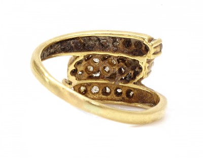Lot 1163 - An Indian high carat gold cubic zirconia crossover ring