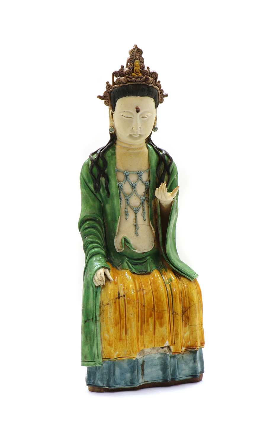 Lot 104 - A Chinese sancai-glazed pottery figure