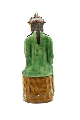 Lot 104 - A Chinese sancai-glazed pottery figure