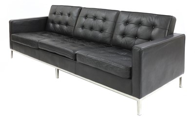 Lot 610 - A modern 'Relax'-style black leather sofa