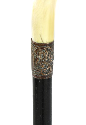 Lot 251 - A Victorian ivory handled walking cane