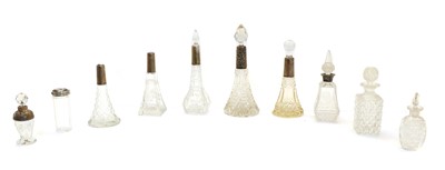 Lot 227 - A collection of glass scent bottles