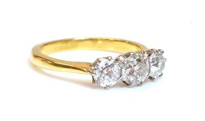 Lot 331 - A gold three stone diamond ring
