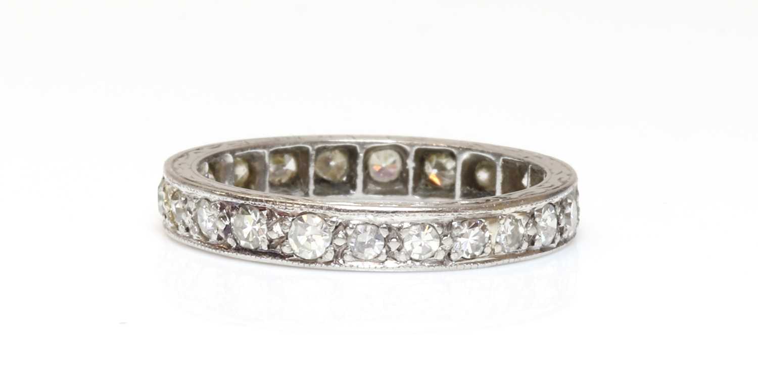 Lot 148 - A platinum diamond set full eternity ring