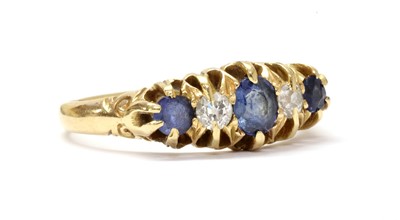Lot 1028 - An Edwardian 18ct gold sapphire and diamond five stone ring