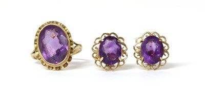 Lot 1254 - A 9ct gold single stone amethyst ring