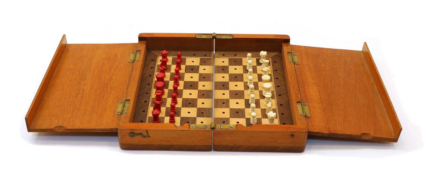 Lot 82 - A travelling chess set