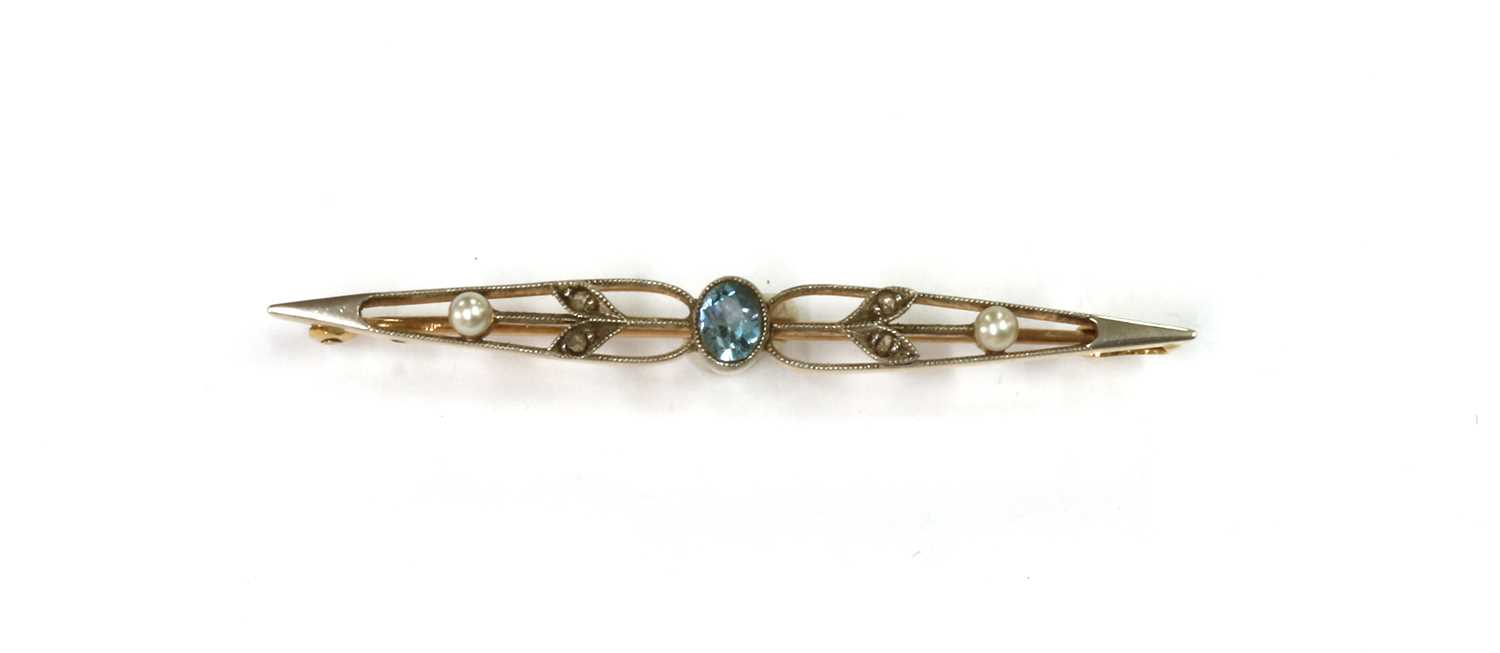 Lot 10 - An Edwardian gold aquamarine, diamond and seed pearl brooch