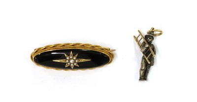 Lot 1024 - A Victorian gold onyx and split pearl brooch