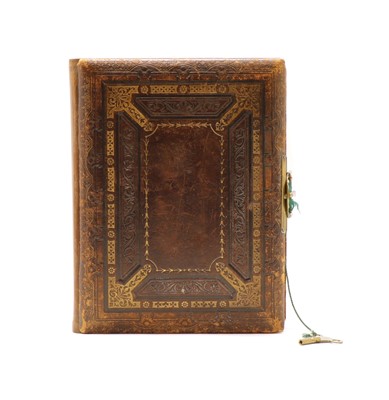 Lot 116 - A late 19th century musical box leather photographs album