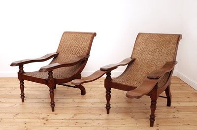Lot 484 - A pair of Indian teak planter's chairs