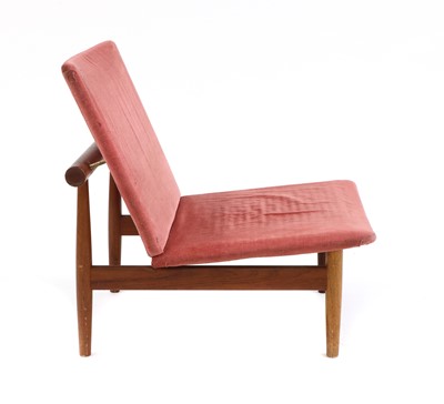 Lot 613 - A 'Japan' teak lounge chair