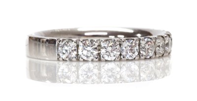 Lot 429 - A platinum diamond set half eternity ring