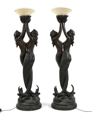 Lot 286 - A pair of large resin bronze uplighters