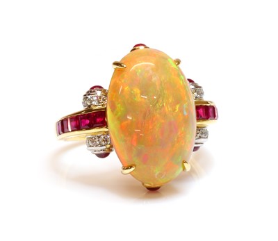 Lot 285 - An opal, ruby and diamond cluster ring