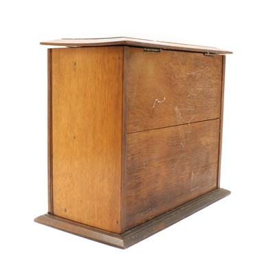 Lot 130 - A Victorian oak table top writing cabinet