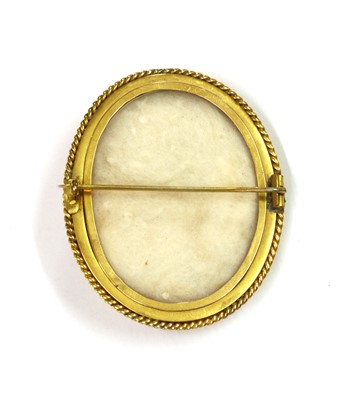 Lot 1012 - A 9ct gold shell cameo brooch