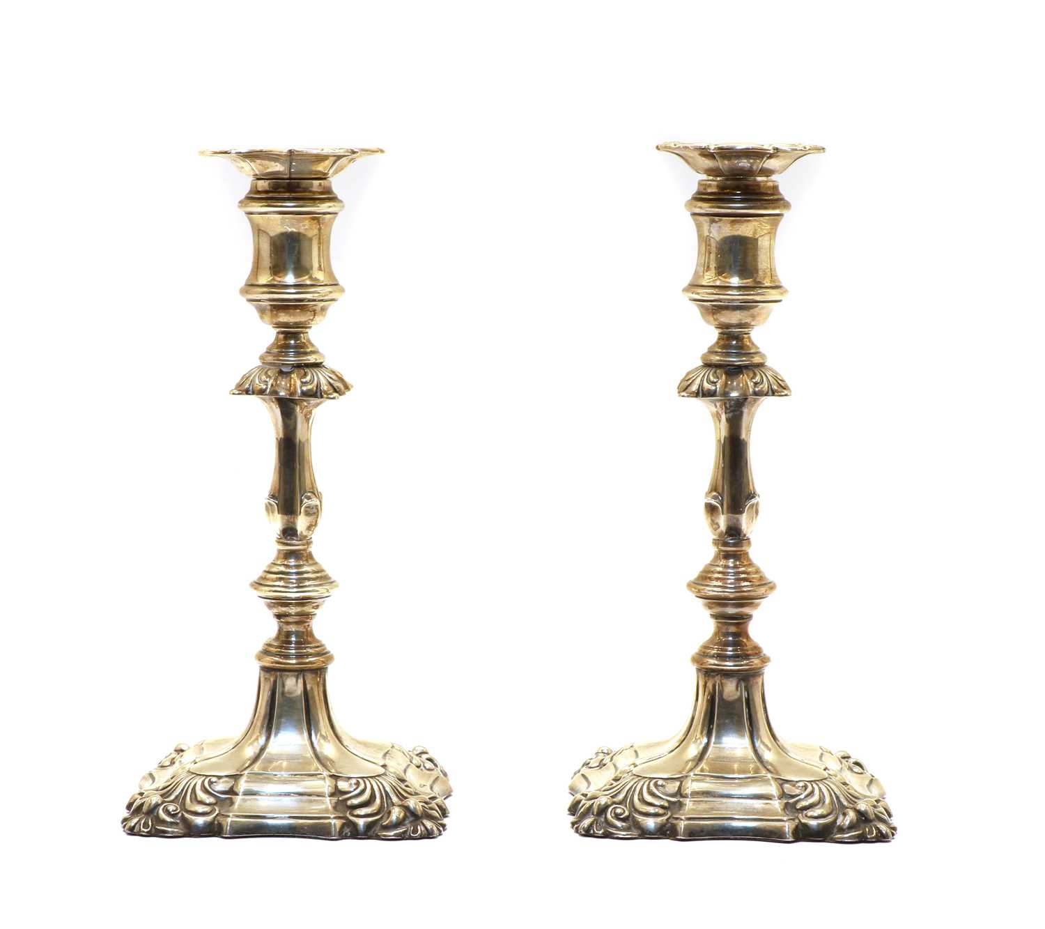 Lot 64 - A pair of Queen Anne style candlesticks by Ellis & Co