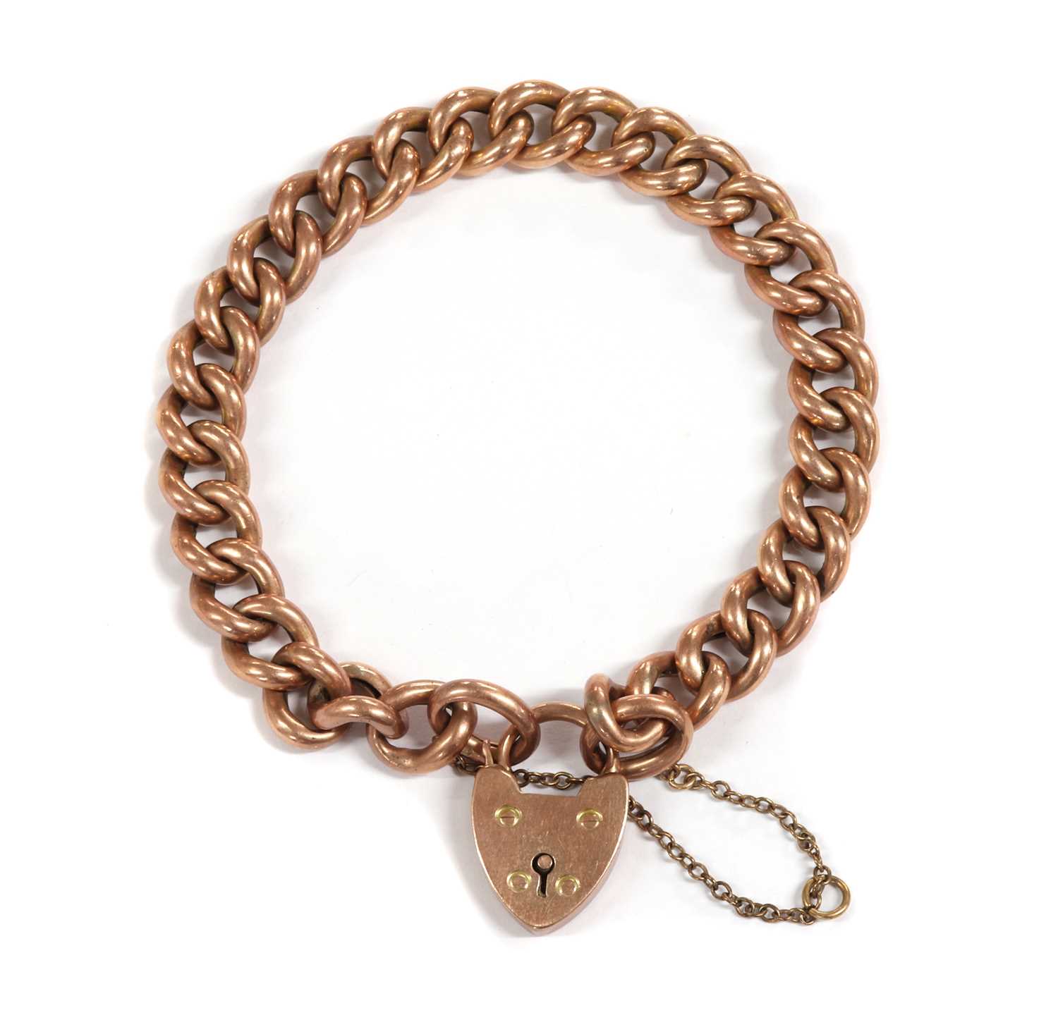 Lot 1106 - A gold hollow curb link bracelet