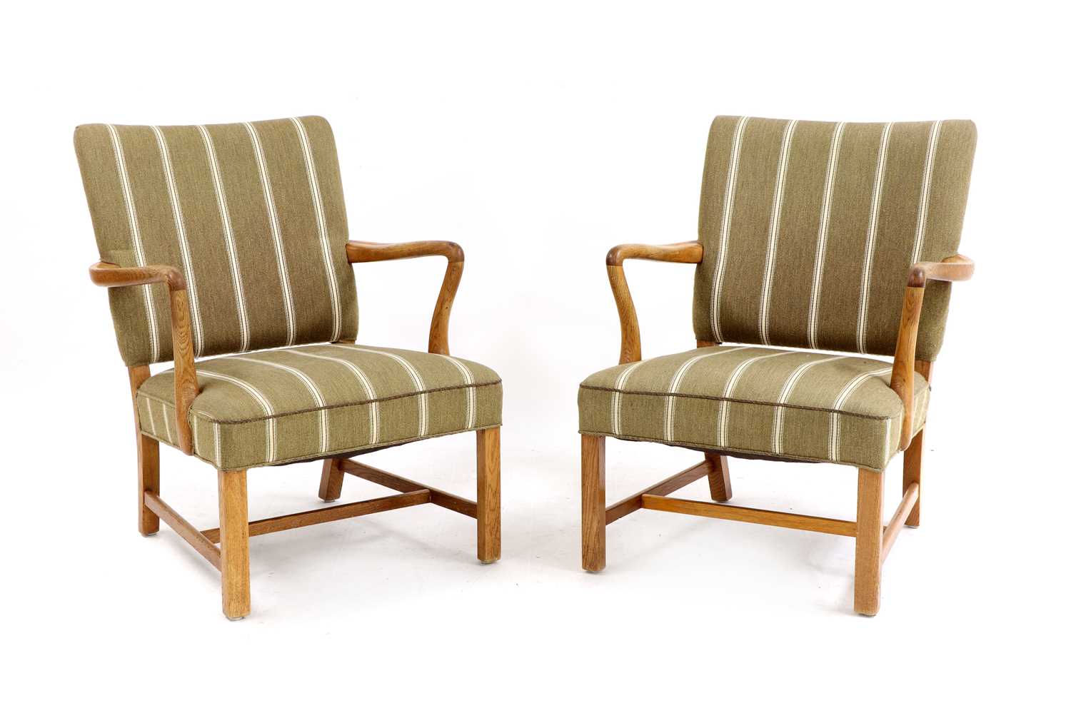 Lot 487 - A pair of Danish oak-framed lounge chairs
