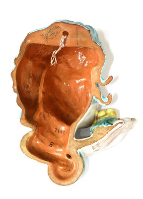 Lot 244 - A Goldscheider pottery wall mask