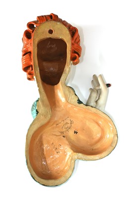 Lot 242 - A Goldscheider pottery wall mask