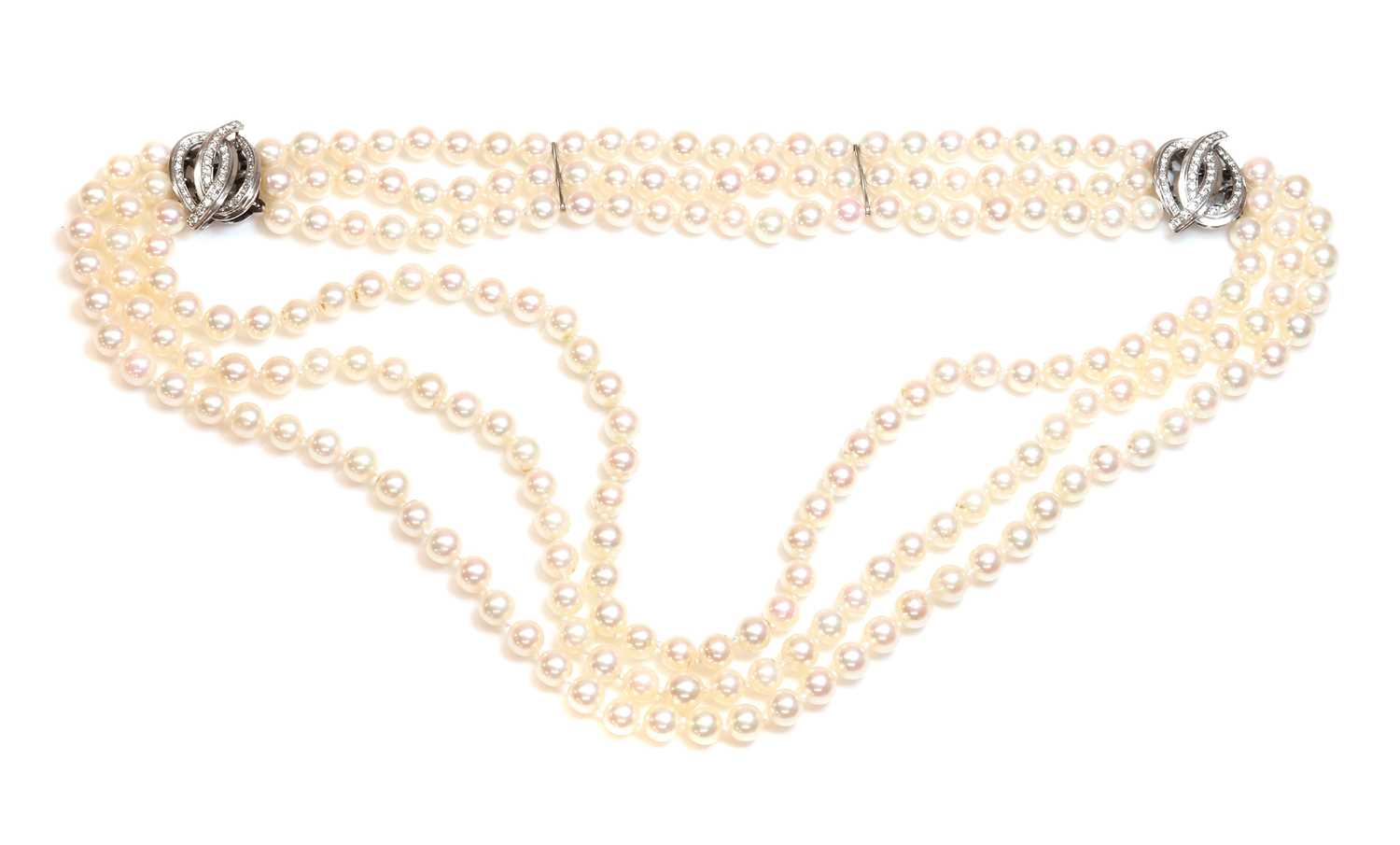 Lot 221 - A three row cultured pearl necklace and bracelet suite