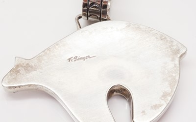 Lot 274 - A silver Navajo Spirit bear pendant, by Thomas Singer