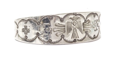 Lot 1340 - An American Southwest Indian-style silver torque bangle, by Tom DeWitt