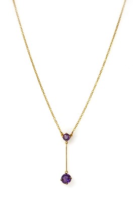 Lot 1255 - A gold amethyst Edna May-style pendant