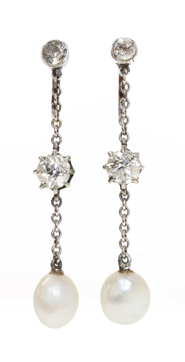 Lot 138 - A pair of Edwardian pearl and diamond drop earrings