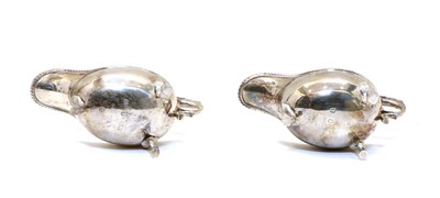 Lot 18 - A pair of Silver Jubilee silver sauce boats by the Silver Club, London