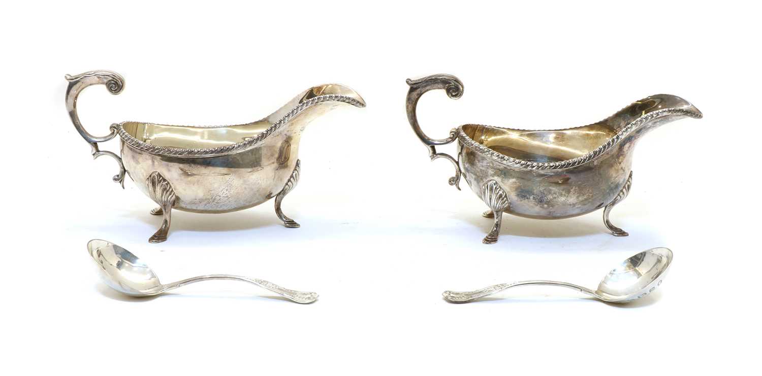 Lot 18 - A pair of Silver Jubilee silver sauce boats by the Silver Club, London