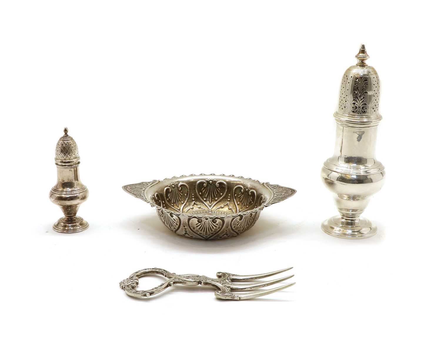 Lot 19 - A silver sugar shaker of baluster form