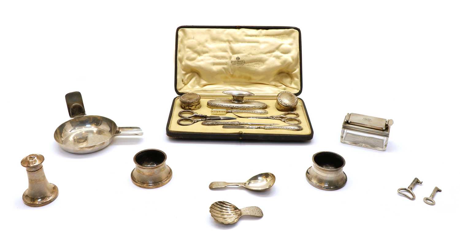 Lot 31 - A Mappin & Webb cased silver manicure set