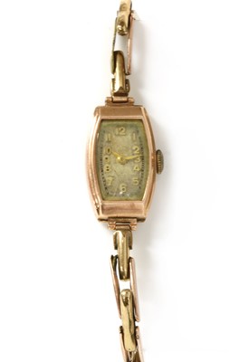 Lot 1513 - A ladies' 9ct gold mechanical bracelet watch