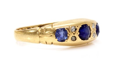 Lot 1029 - An Edwardian 18ct gold sapphire and diamond ring
