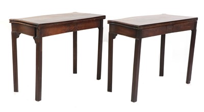 Lot 213 - A pair of George III inlaid mahogany foldover card tables