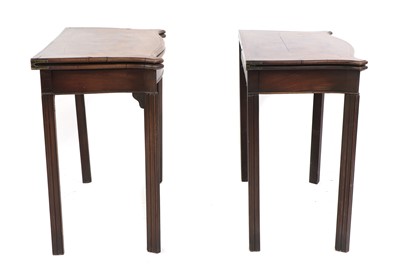 Lot 213 - A pair of George III inlaid mahogany foldover card tables