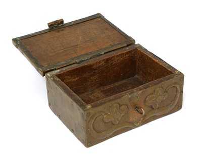 Lot 66 - An Arts and Crafts embossed copper casket