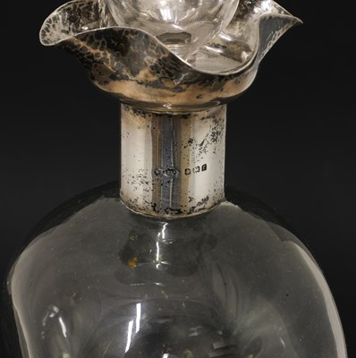 Lot 111 - A silver-mounted Dewar's Whisky decanter and stopper