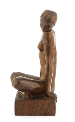 Lot 219 - A carved wood sculpture of a nude