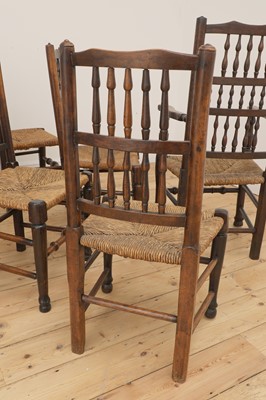 Lot 447 - A matched set of eight spindle back dining chairs