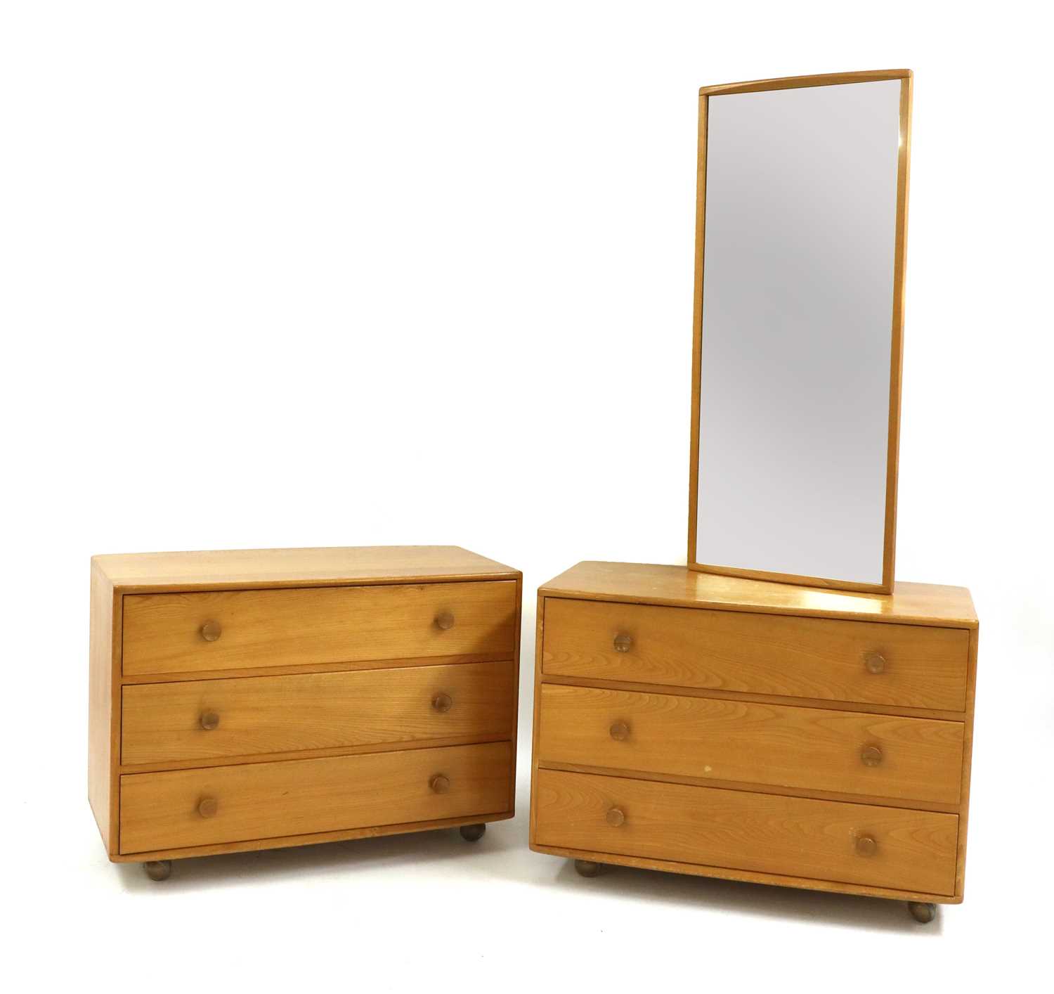Lot 486 - A pair of Ercol elm chests of drawers