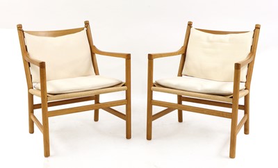 Lot 630 - A pair of Danish 'CH44' oak armchairs