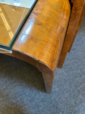 Lot 253 - An Art Deco maple nest of tables
